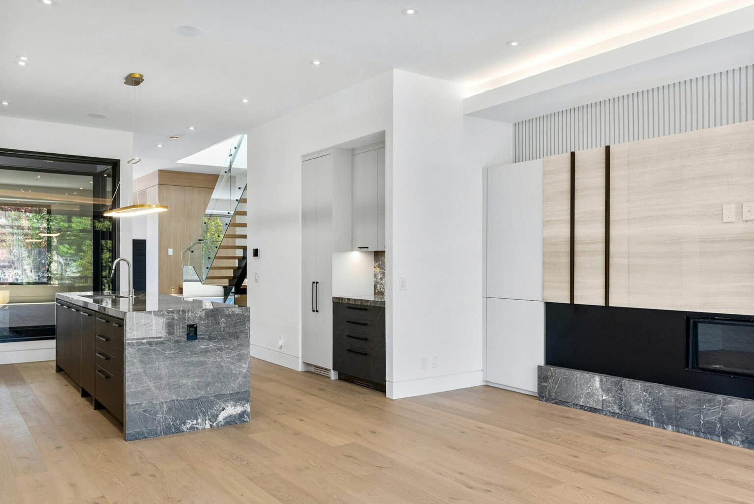 Large bright modern room with wooden floor